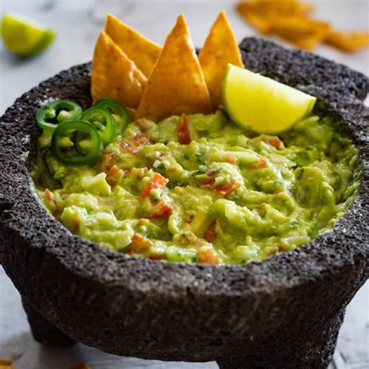 How long before serving can I make guacamole?