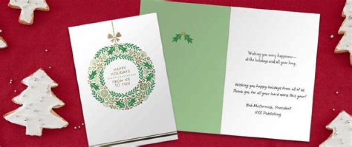 How should a business sign a Christmas card?